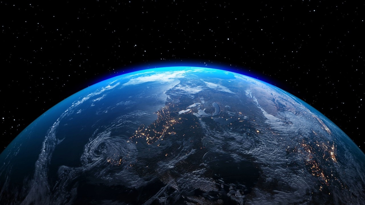 a view of the earth from space, showing the part where it is currently night