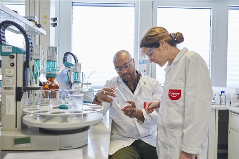 Scientists conducting research in Colgate laboratory for product development.  Filename: