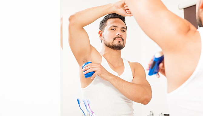 Man applying speedstick