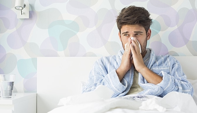 Sick man in bed