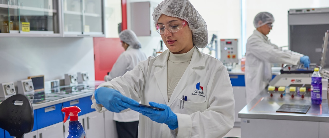 Group of scientists in a laboratory testing out innovative new products for consumers.