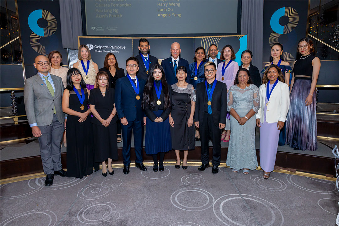Winners from the Asia Pacific division wear medals at the Rainbow Room