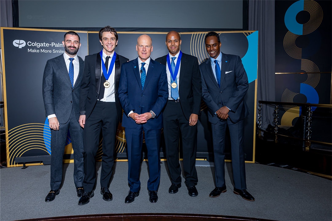 Winners from Team Corporate Division wear medals at the Rainbow Room