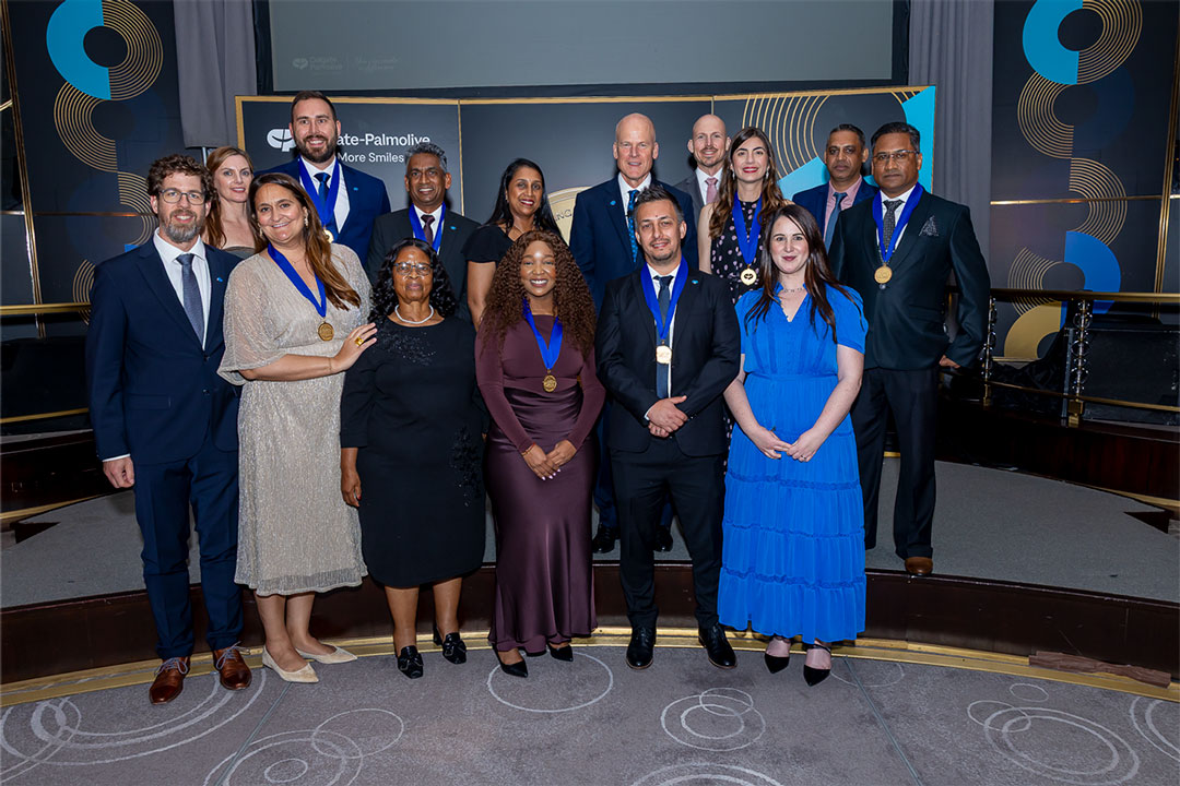 Winners from the Africa/Eurasia division wear medals at the Rainbow Room