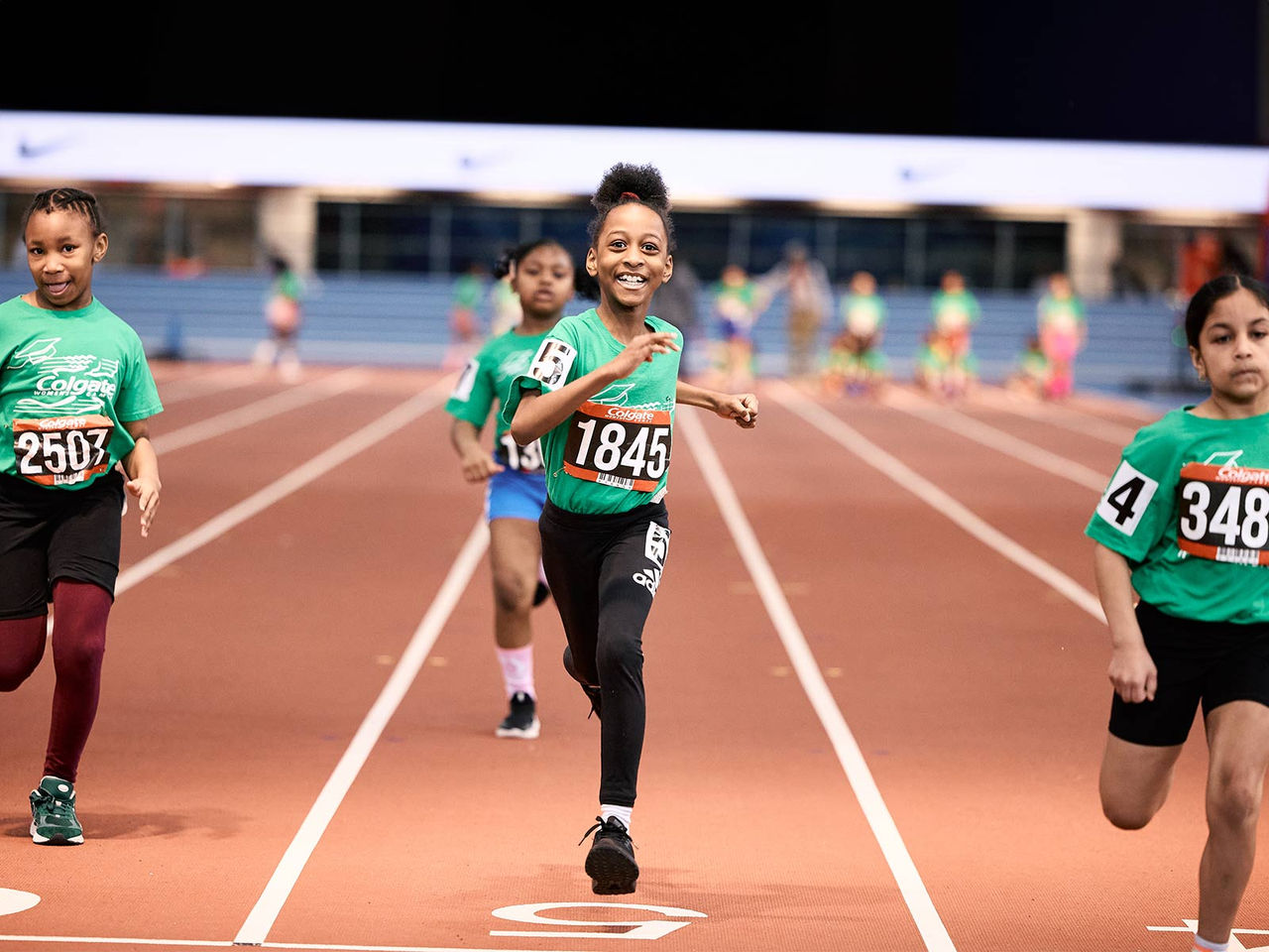 little girls running in colgate womens games