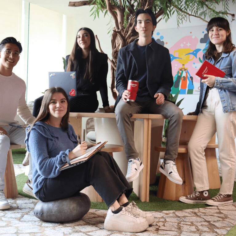 a group of interns smiling