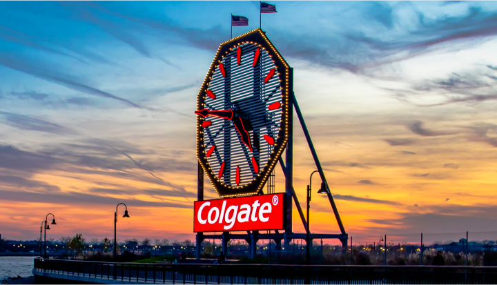 Refurbished Colgate Clock in Jersey City, New Jersey with a beautiful sunset behind.